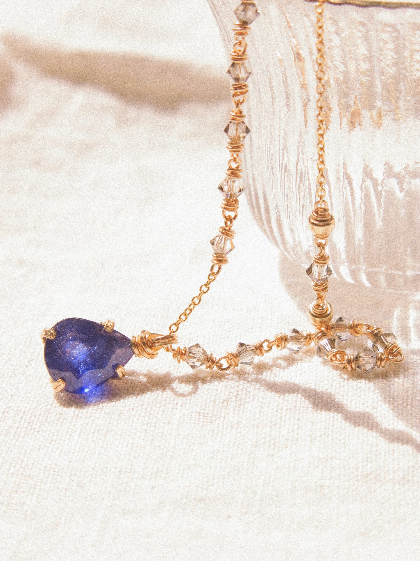 Indigo: Prong Set Teardrop Faceted Blue Sapphire Necklace with Swarovski Crystal Accent Chain, 14K Gold Fill