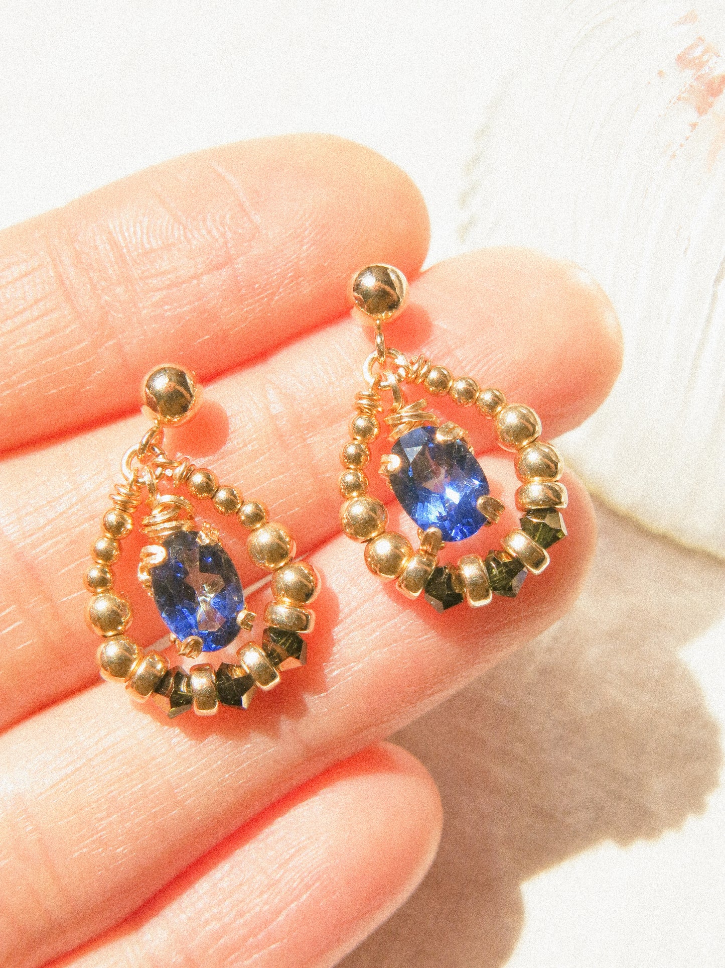 Suila Earrings with Faceted Blue Topaz in Prong Setting with Beaded Frame in Swarovski Crystals, 14K Gold Fill