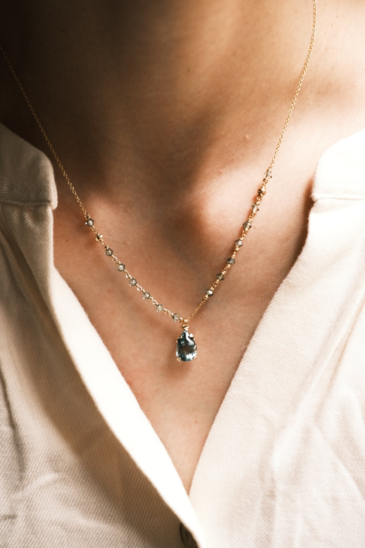 Blue: Prong Set Teardrop Faceted Icy Blue Tourmaline Necklace with Swarovski Crystal Accent Chain, 14K Gold Fill