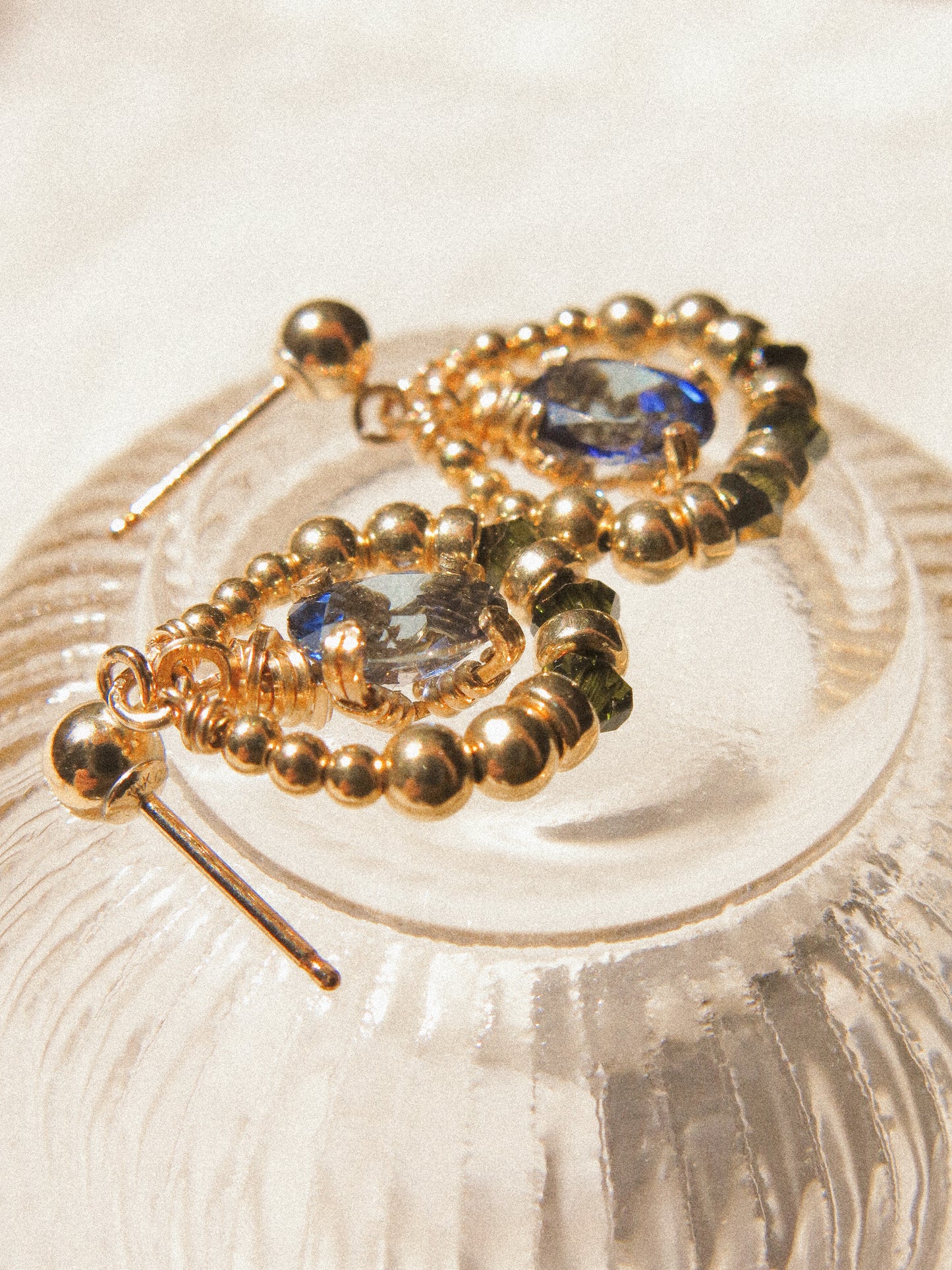Suila Earrings with Faceted Blue Topaz in Prong Setting with Beaded Frame in Swarovski Crystals, 14K Gold Fill