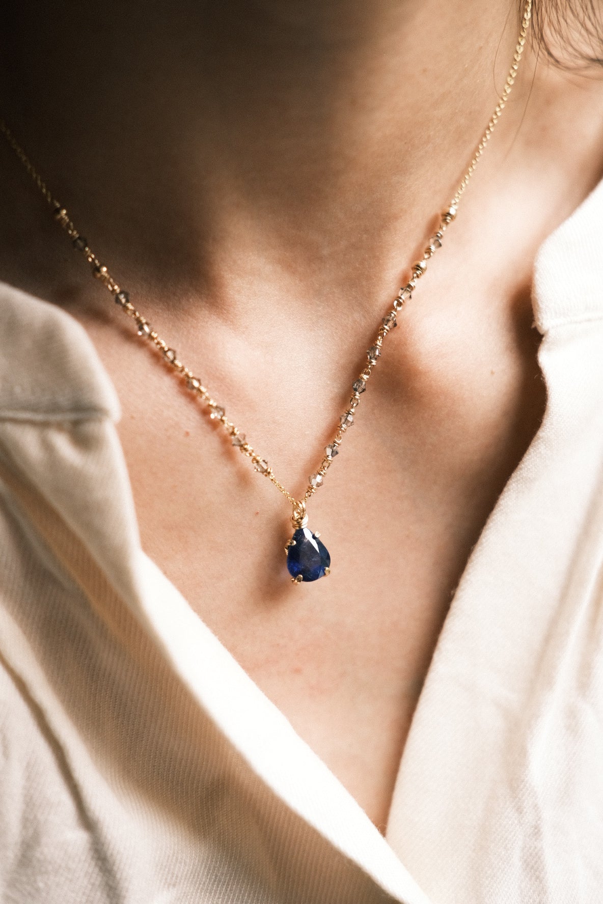Indigo: Prong Set Teardrop Faceted Blue Sapphire Necklace with Swarovski Crystal Accent Chain, 14K Gold Fill