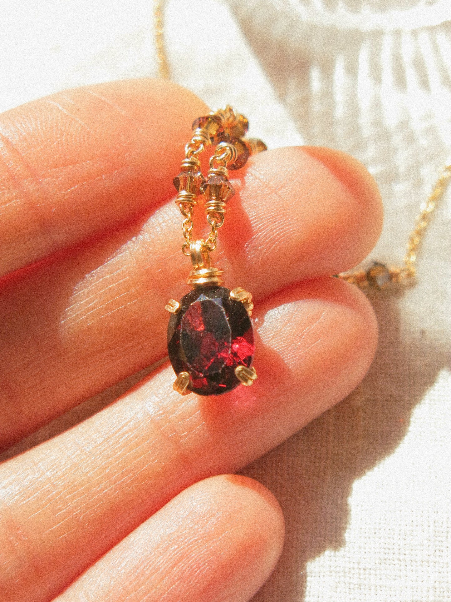 Red: Prong Set Oval Faceted Mozambique Garnet Necklace with Swarovski Crystal Accent Chain, 14K Gold Fill