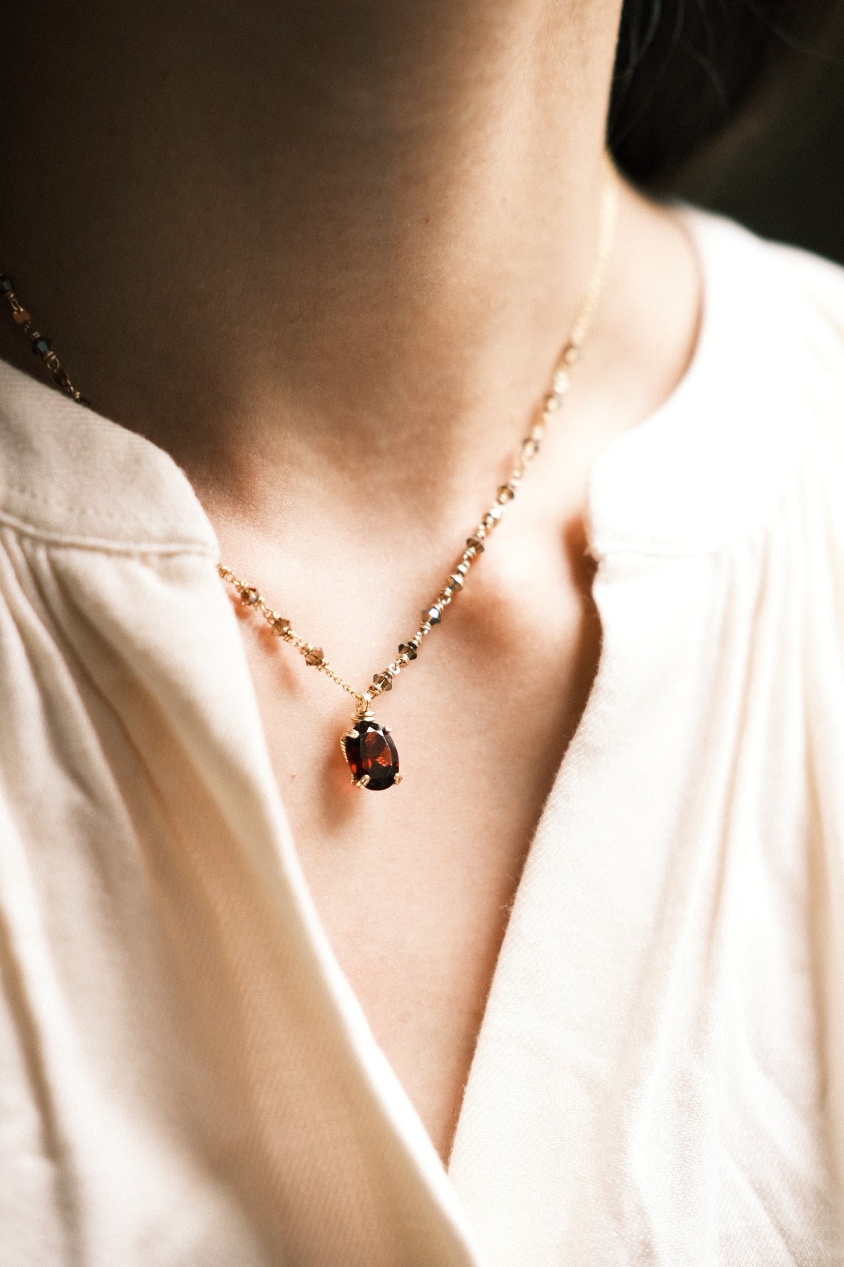 Red: Prong Set Oval Faceted Mozambique Garnet Necklace with Swarovski Crystal Accent Chain, 14K Gold Fill