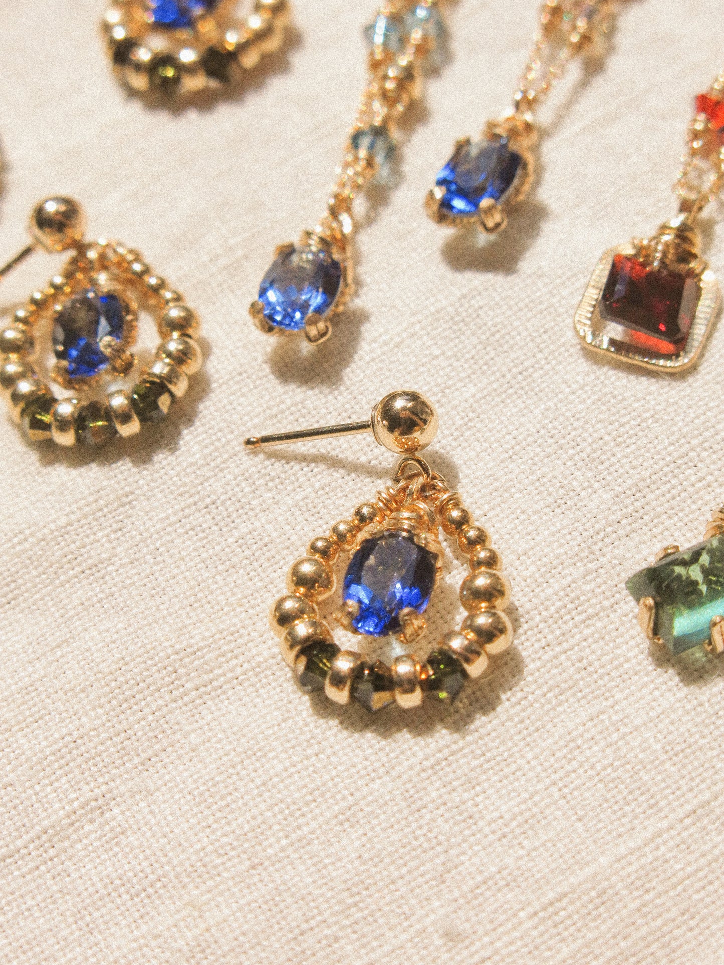 Suila Earrings with Faceted Blue Topaz in Prong Setting with Beaded Frame in Swarovski Crystals, 14K Gold Fill