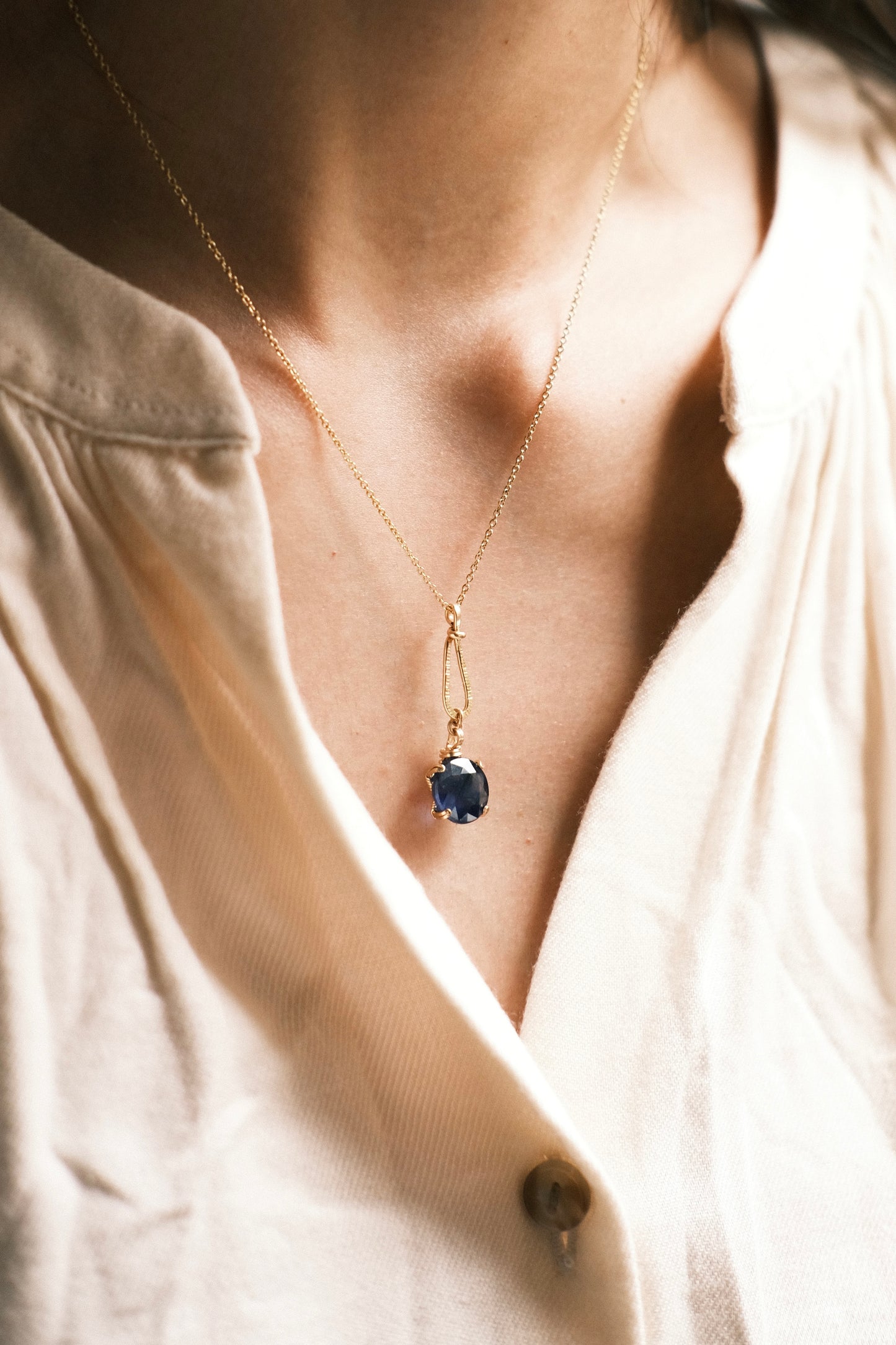 Prong Set Faceted Round Blue Sapphire Necklace with Hammered Teardrop Frame, 14K Gold Fill