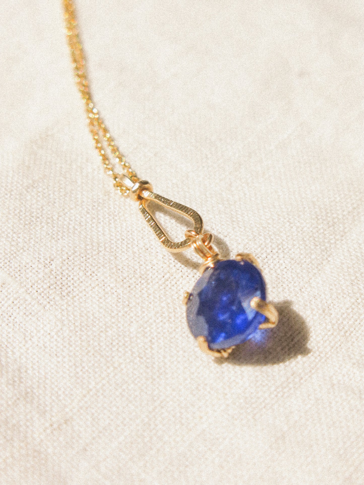 Prong Set Faceted Round Blue Sapphire Necklace with Hammered Teardrop Frame, 14K Gold Fill