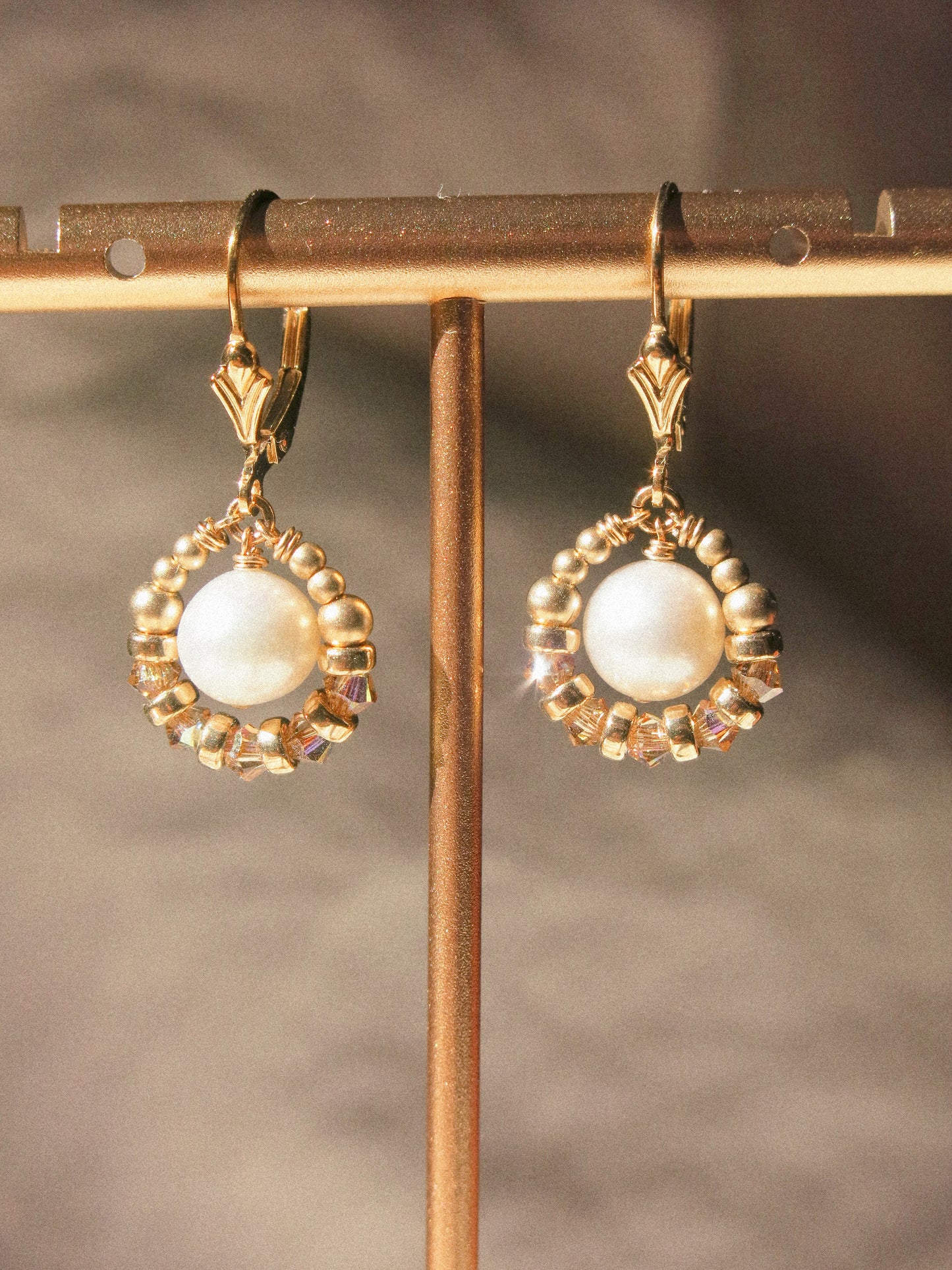 Suila Earrings with White Round Pearl and Gold Champagne Swarovski Crystal, 14K Gold Fill, Fleur de Lis Lever Back Earrings