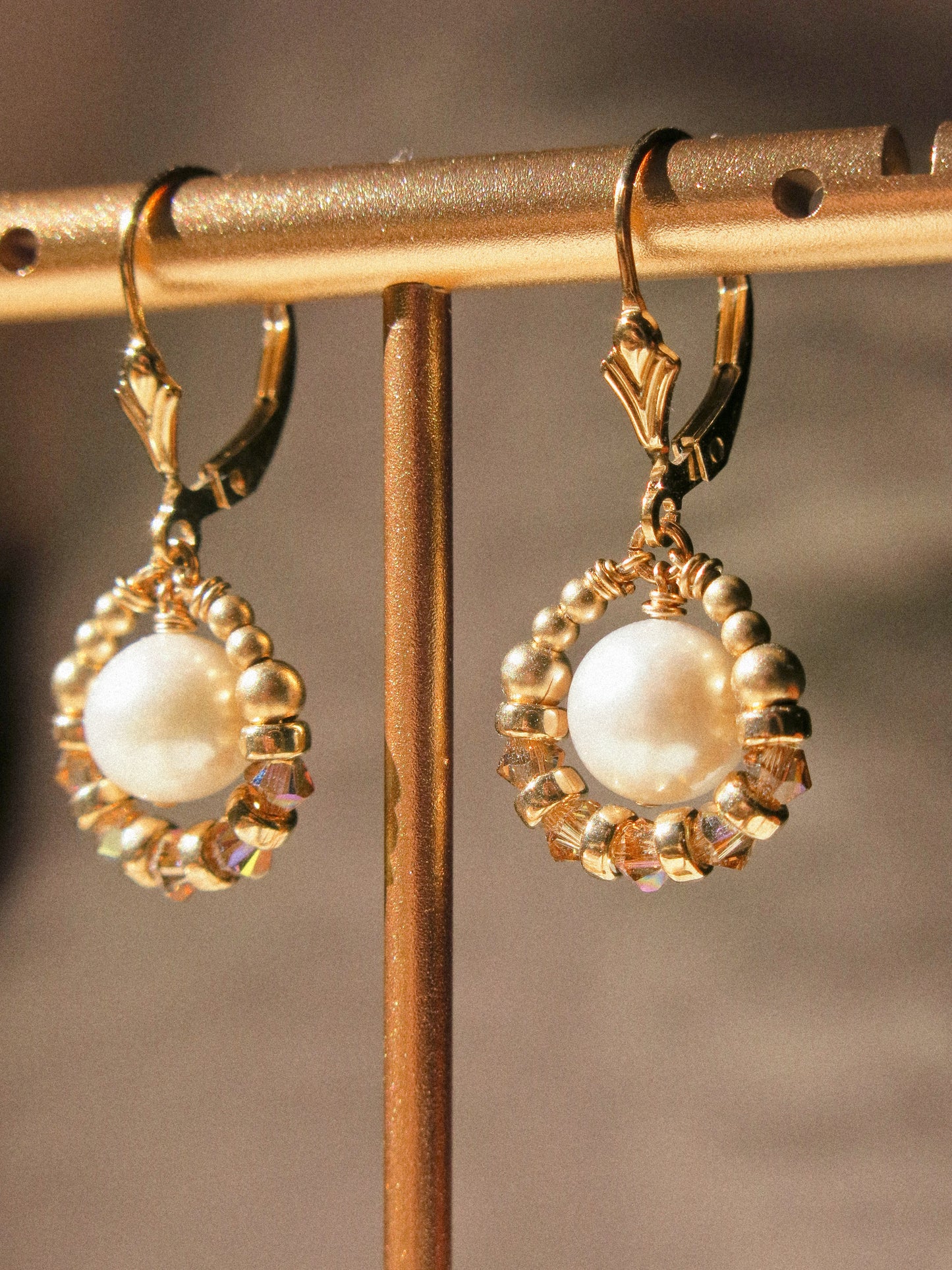 Suila Earrings with White Round Pearl and Gold Champagne Swarovski Crystal, 14K Gold Fill, Fleur de Lis Lever Back Earrings
