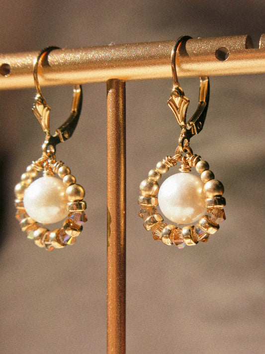Suila Earrings with White Round Pearl and Gold Champagne Swarovski Crystal, 14K Gold Fill, Fleur de Lis Lever Back Earrings