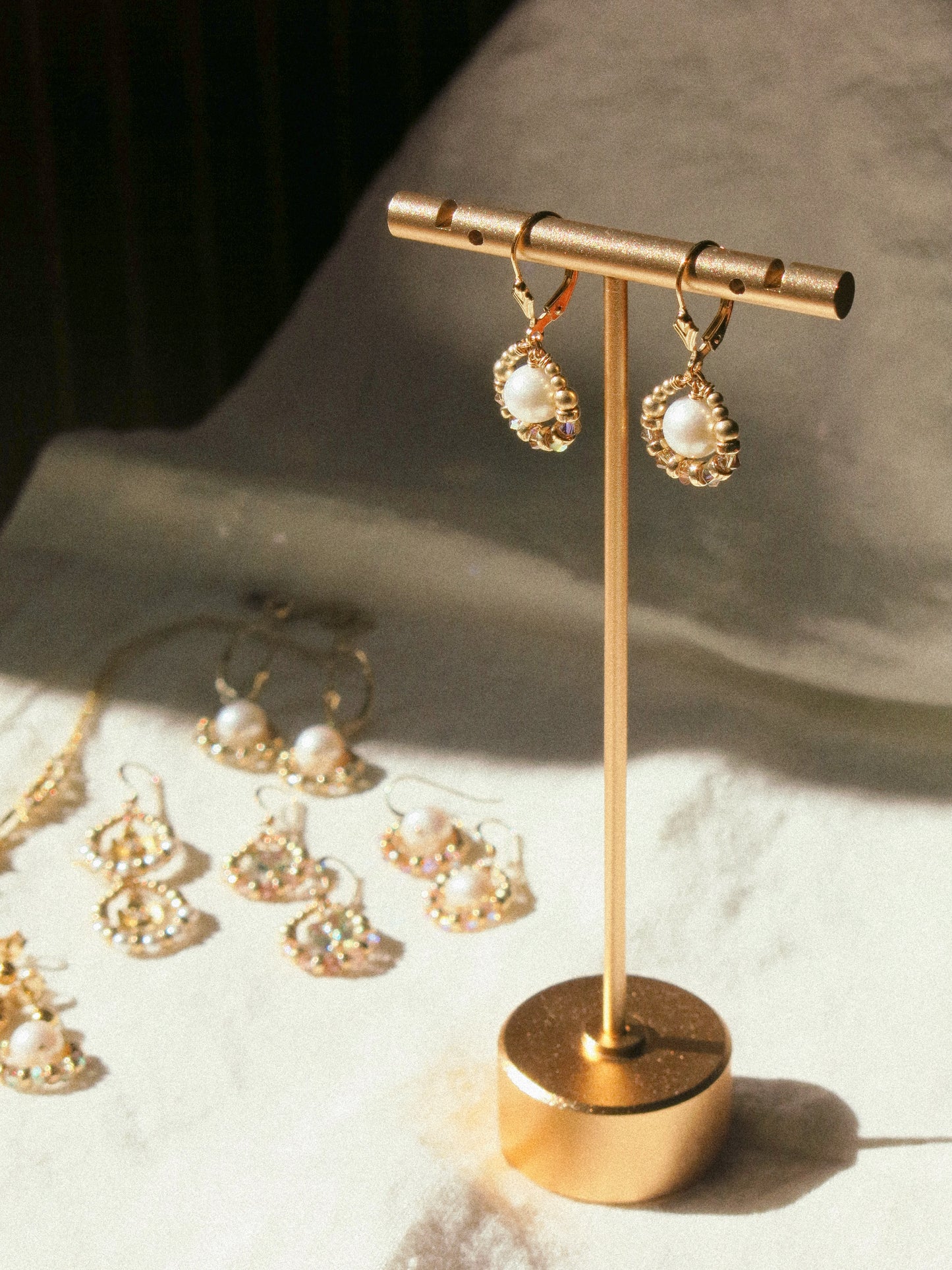 Suila Earrings with White Round Pearl and Gold Champagne Swarovski Crystal, 14K Gold Fill, Fleur de Lis Lever Back Earrings