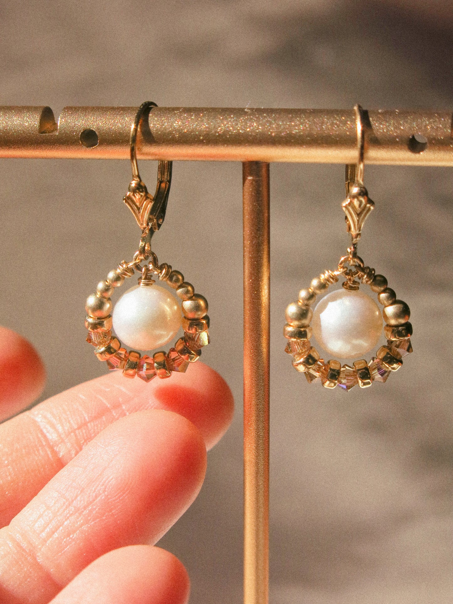 Suila Earrings with White Round Pearl and Gold Champagne Swarovski Crystal, 14K Gold Fill, Fleur de Lis Lever Back Earrings