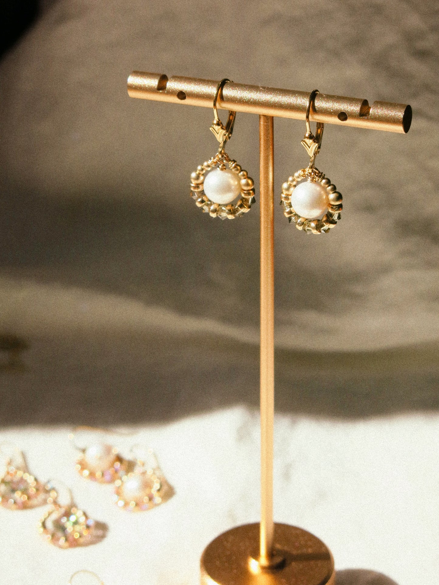 Suila Earrings with White Round Pearl and Muted Silver Green Swarovski Crystal, 14K Gold Fill, Fleur de Lis Lever Back Earrings