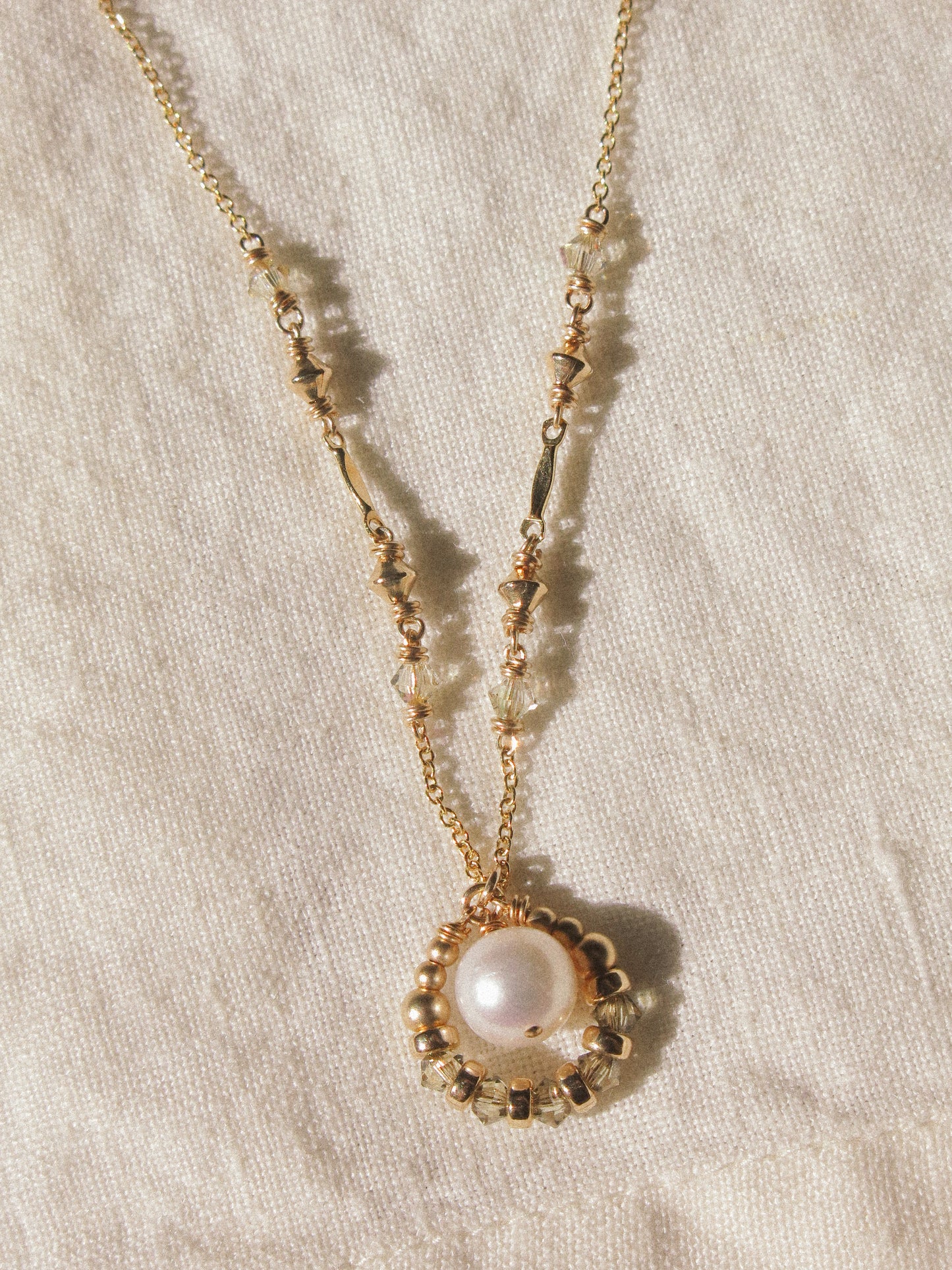 Suila Necklace with White Round Pearl and Muted Silver Green Swarovski Crystal, 14K Gold Fill