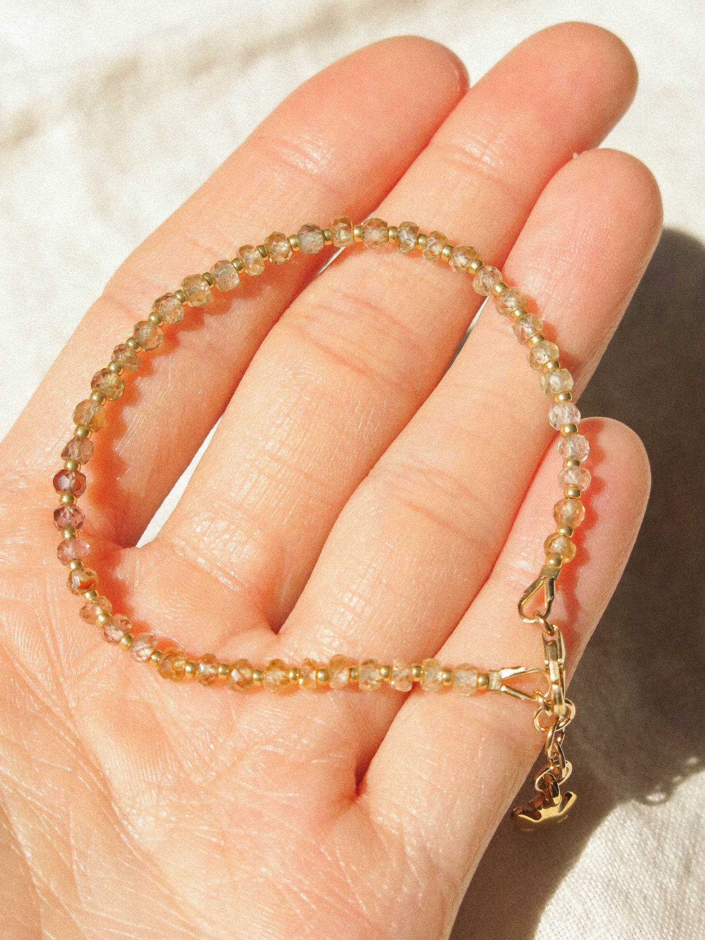 Mauve Ombré Zircon Strung Bracelet #2 with Gold Miyuki Beads and White Sakura Enamel Charm, 6" Adjustable, 14K Gold Fill