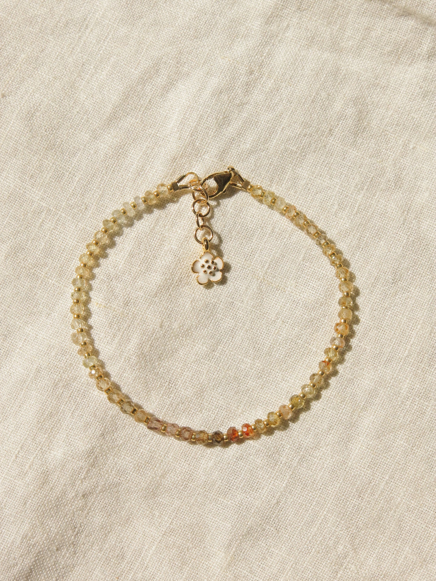 Mauve Ombré Zircon Strung Bracelet #1 with Gold Miyuki Beads and White Sakura Enamel Charm, 6.75" Adjustable, 14K Gold Fill