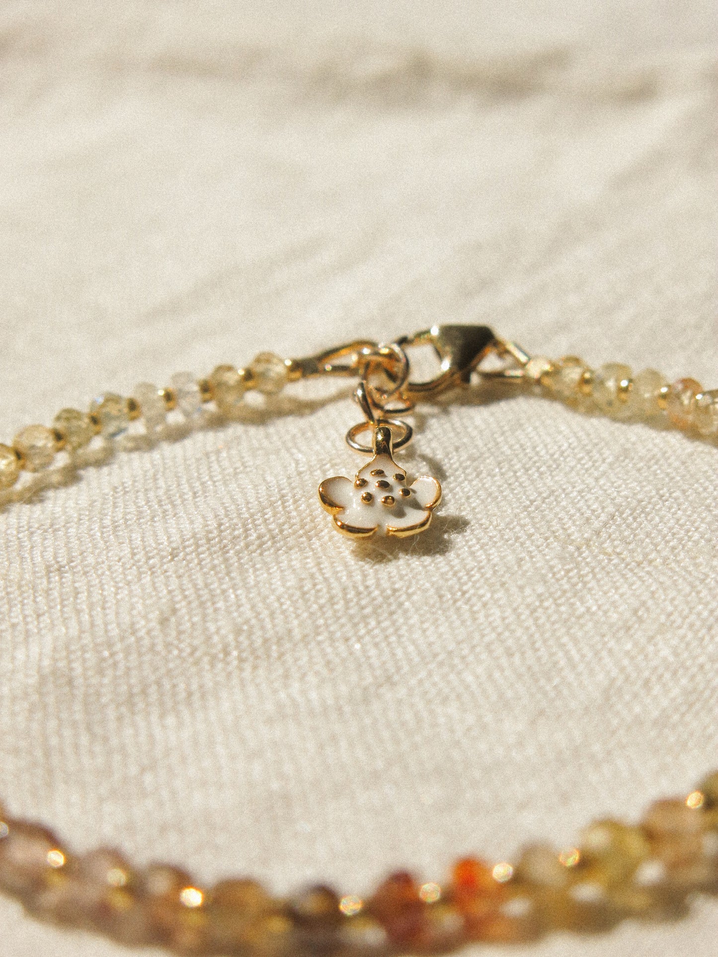Mauve Ombré Zircon Strung Bracelet #1 with Gold Miyuki Beads and White Sakura Enamel Charm, 6.75" Adjustable, 14K Gold Fill