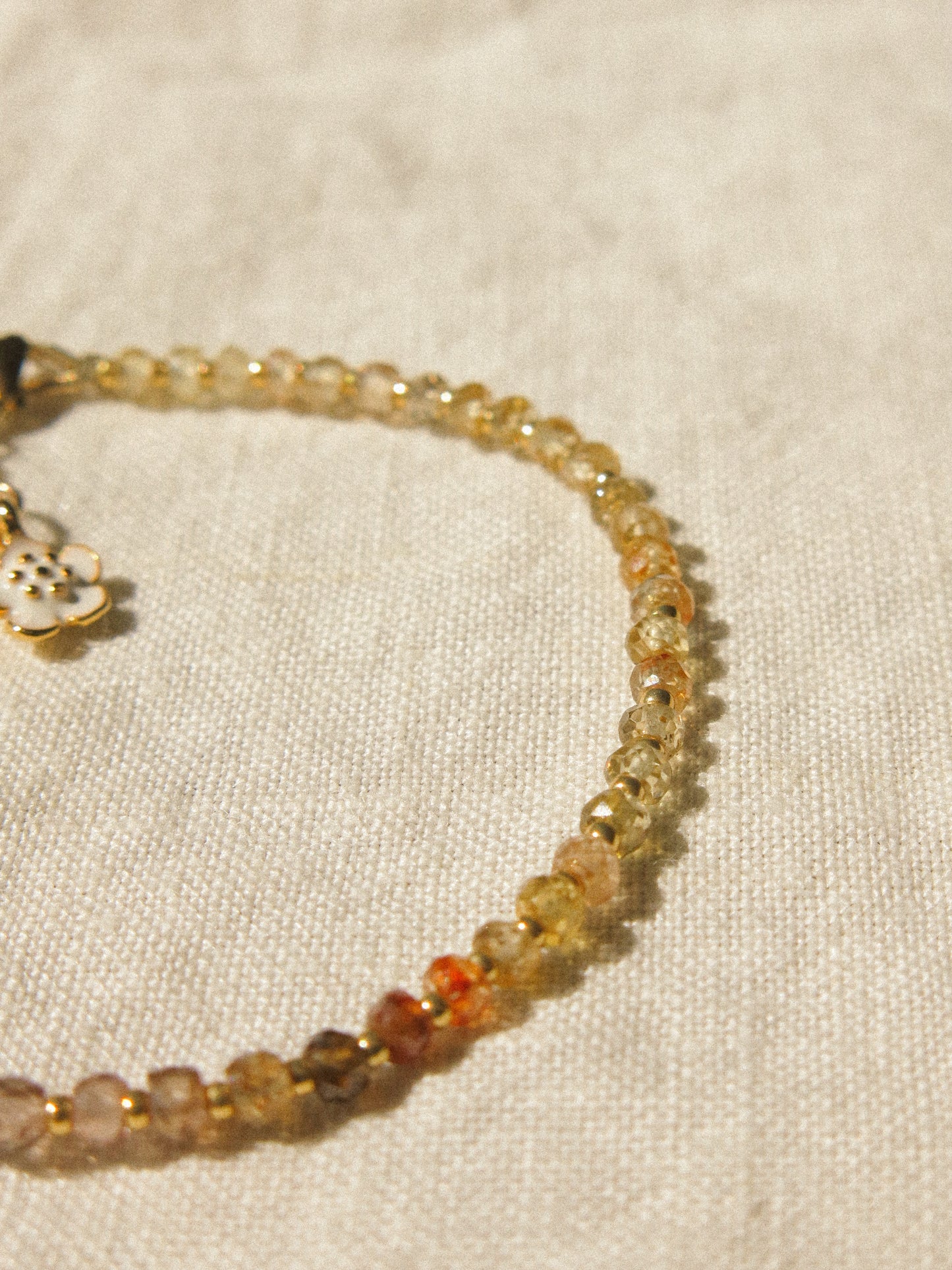 Mauve Ombré Zircon Strung Bracelet #1 with Gold Miyuki Beads and White Sakura Enamel Charm, 6.75" Adjustable, 14K Gold Fill