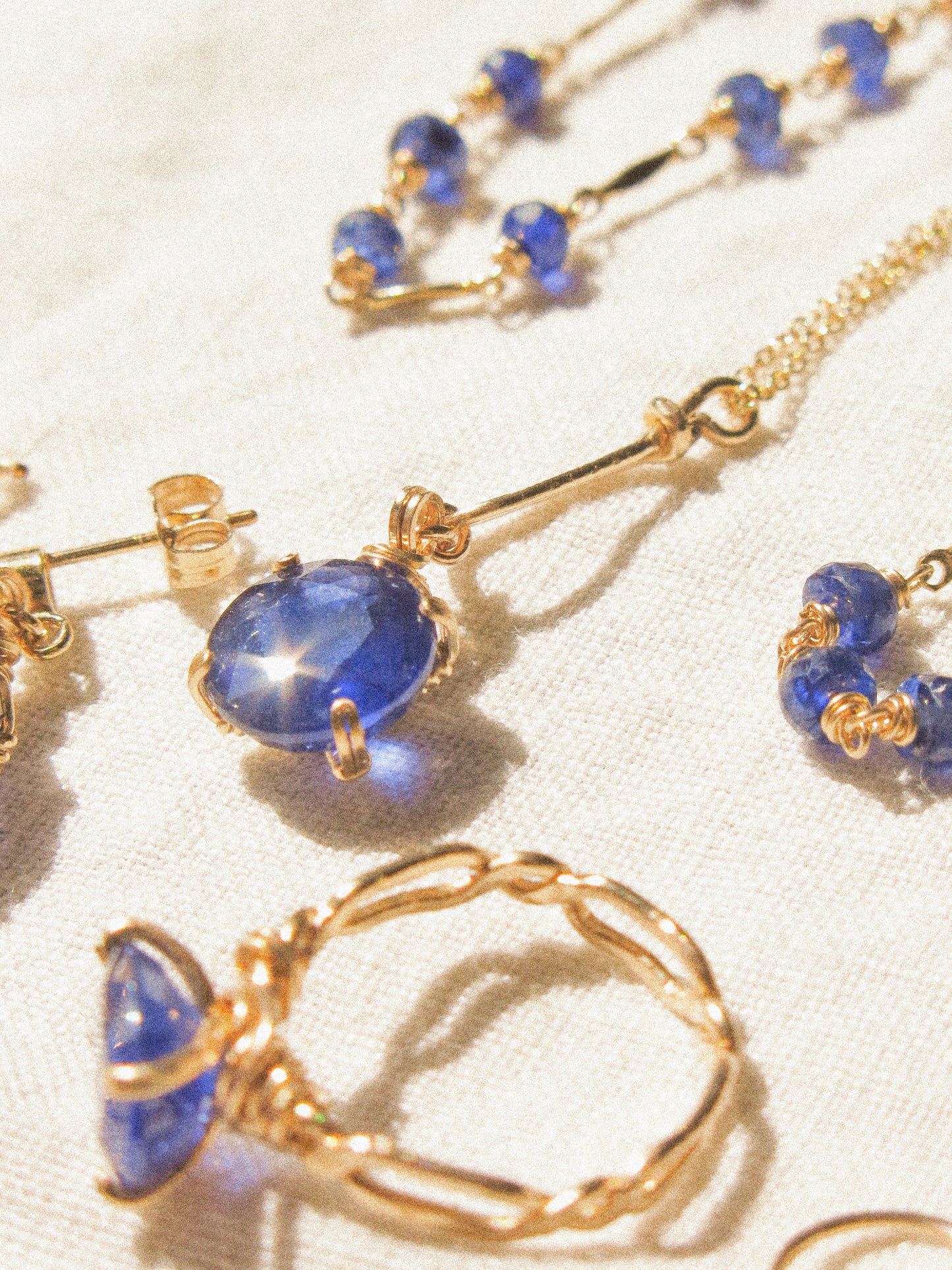 Prong Set Faceted Round Blue Sapphire Necklace with Hammered Teardrop Frame, 14K Gold Fill