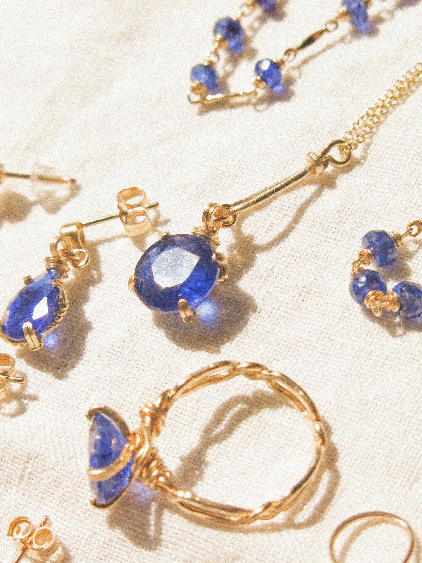 Prong Set Faceted Round Blue Sapphire Necklace with Hammered Teardrop Frame, 14K Gold Fill